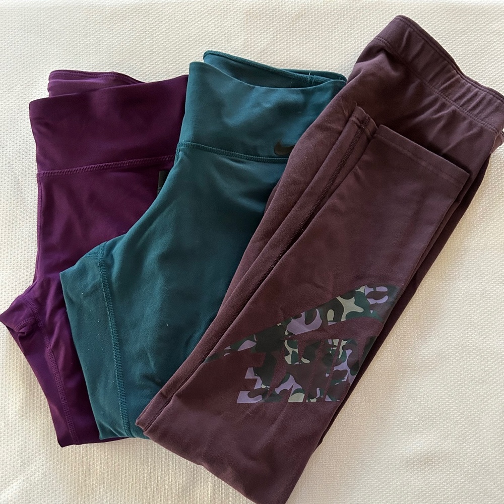 Nike Women's size Medium bundle of 3 leggings